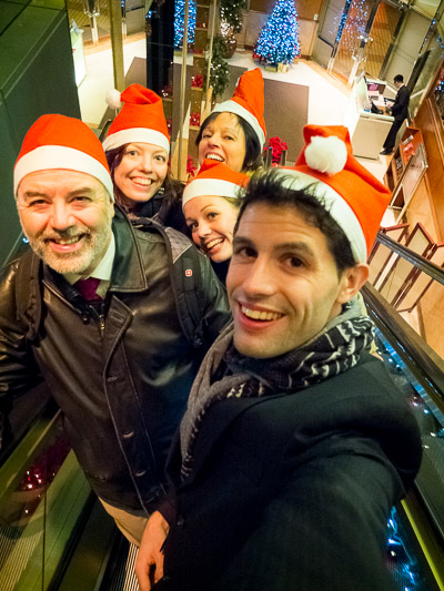 The family in Christmas hats